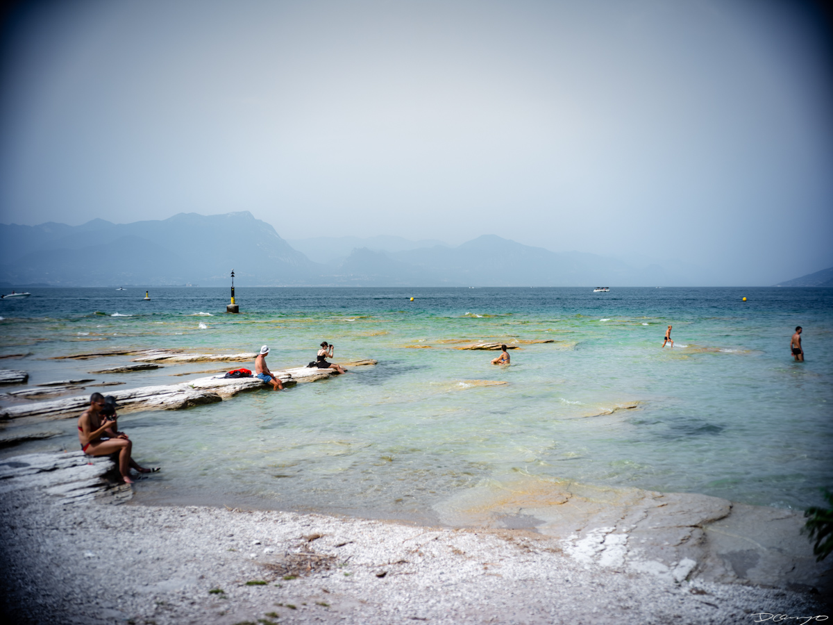 Photos from a trip through Italy in Summer of 2023. Locations include Rome, Florence, Tuscany, Castello di Bossi in Chianti, Siena, San Gimignano, Sirmione on Lake Garda, Bologna, Gudon, Italian Dolomites, Seceda, Cadini di Misurina, and Venice.